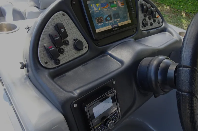 Slide: The Image of 2018 Veranda VF22TT boat dashboard with Garmin navigation system and control panel. - 16