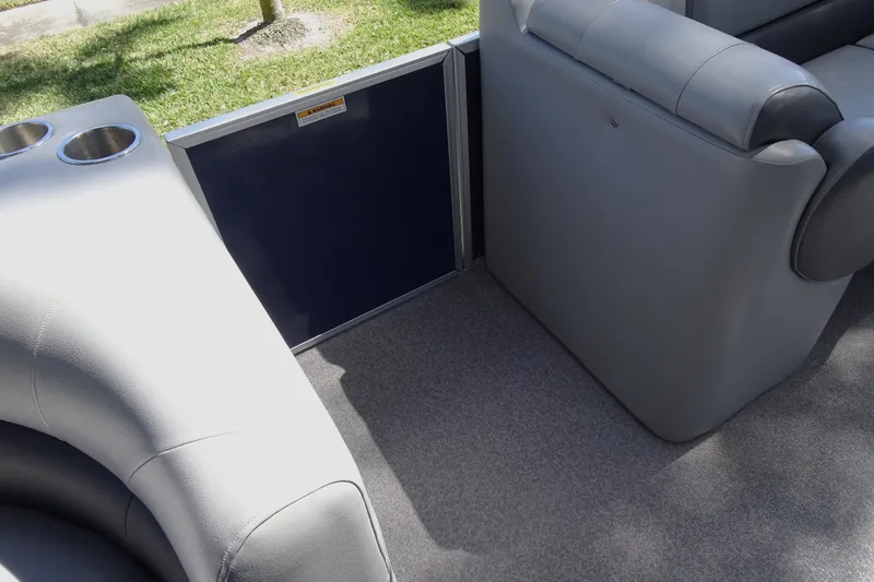 Slide: The Image of 2018 Veranda VF22TT boat interior with gray seating and cup holders. - 19