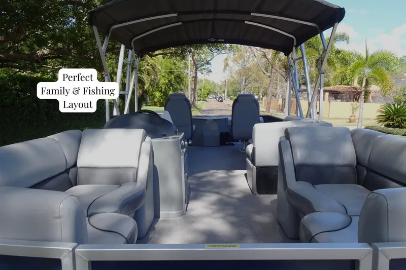 Slide: The Image of 2018 Veranda VF22TT pontoon boat with spacious family and fishing layout, shaded seating. - 2