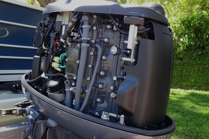 Slide: The Image of Close-up of a 2018 Veranda VF22TT boat engine, showcasing intricate mechanical components. - 24