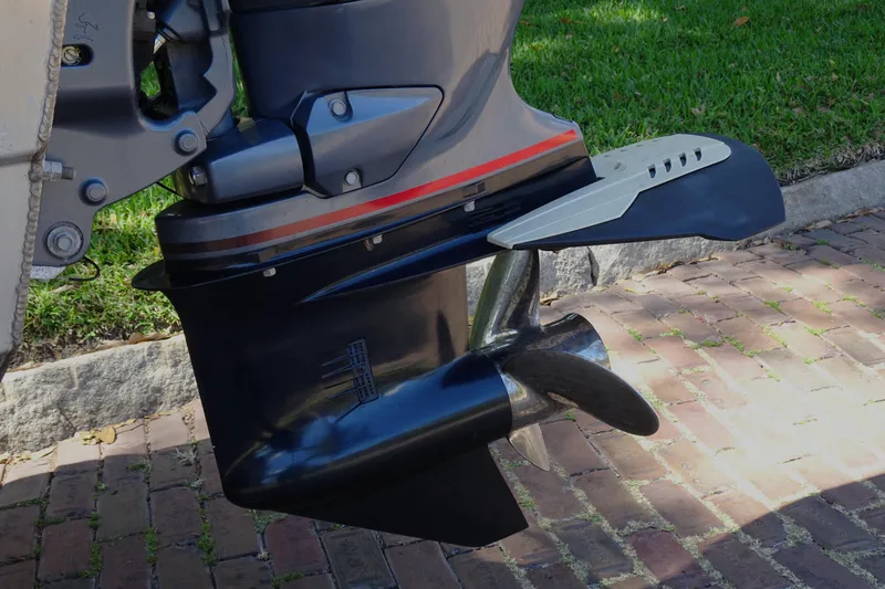 Slide: The Image of 2018 Veranda VF22TT boat motor with propeller on brick pavement background. - 25