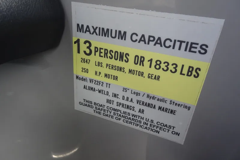 Slide: The Image of 2018 Veranda VF22TT capacity label: 13 persons, 1833 lbs, 250 HP motor. - 29