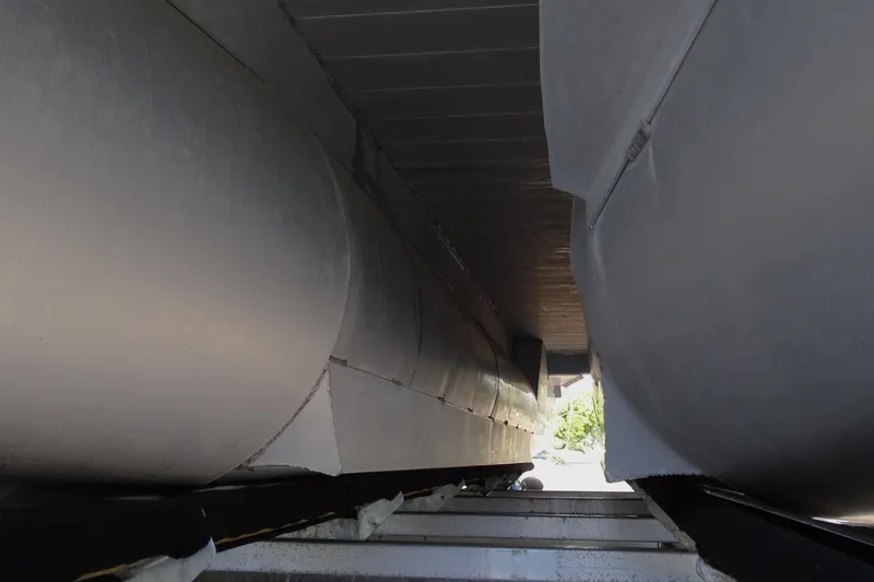 Slide: The Image of Underneath view of a 2018 Veranda VF22TT pontoon boat, showcasing its structural design. - 9