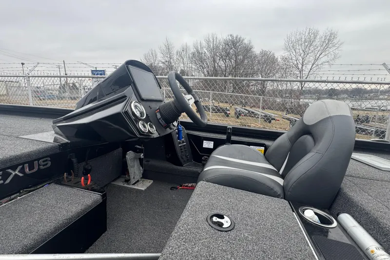 Slide: The Image of 2021 Vexus AVX 1880 boat interior with steering wheel and seating. - 9