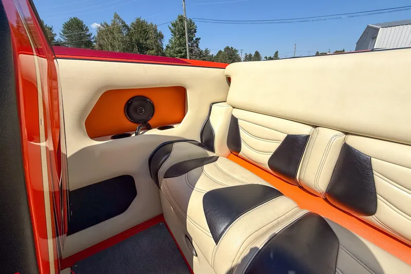 Slide: The Image of Interior of 2012 DCB 28 Extreme boat with beige and black seating. - 15