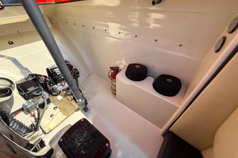 Slide: The Image of Interior of 2012 DCB 28 Extreme boat showing equipment and fire extinguisher. - 18