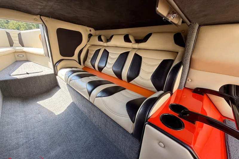 Slide: The Image of Luxurious interior of 2012 DCB 28 Extreme boat with stylish seating and vibrant accents. - 20