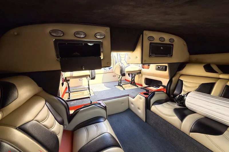 Slide: The Image of Luxurious interior of a 2012 DCB 28 Extreme boat with plush seating and modern design. - 22