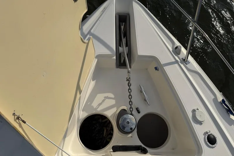 Slide: The Image of 2007 Cruisers Yachts 420 Express interior with seating and navigation equipment. - 16