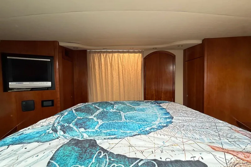 Slide: The Image of Luxurious 2007 Cruisers Yachts 420 Express interior with modern kitchen and wood finishes. - 25