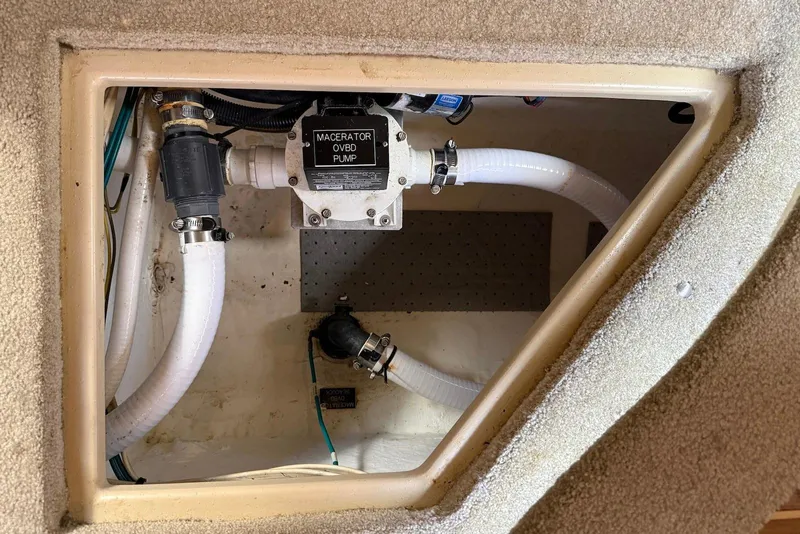 Slide: The Image of Luxurious cabin interior of 2007 Cruisers Yachts 420 Express with nautical-themed bedding. - 29