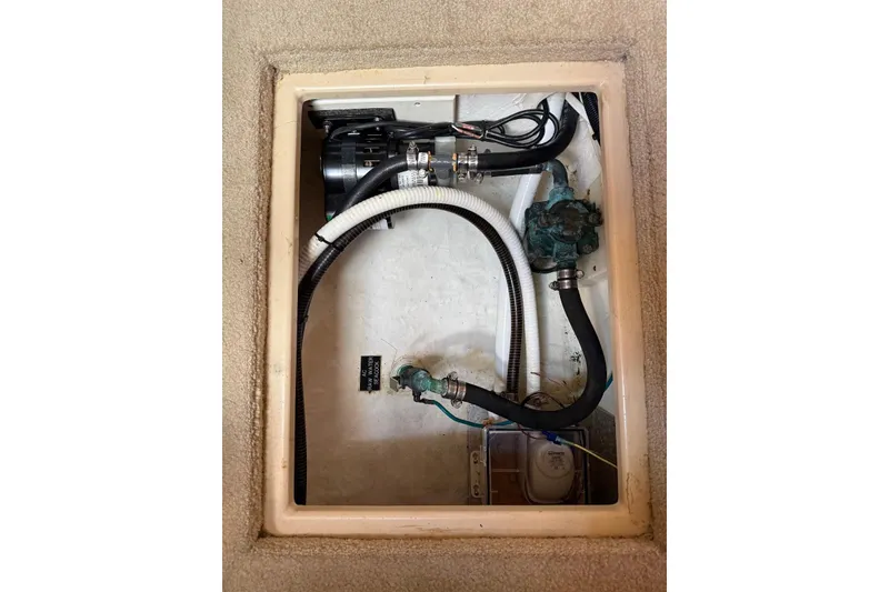 Slide: The Image of Luxurious bathroom in 2007 Cruisers Yachts 420 Express with modern shower and wooden accents. - 30