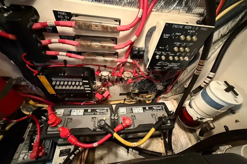 Slide: The Image of Bilge compartment of 2007 Cruisers Yachts 420 Express with hoses and pump system. - 33