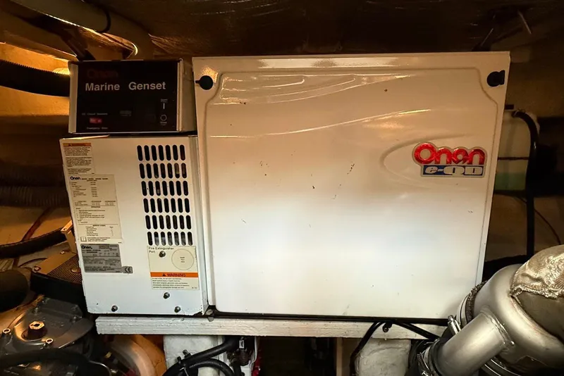 Slide: The Image of Engine room of 2007 Cruisers Yachts 420 Express with wiring and equipment. - 34