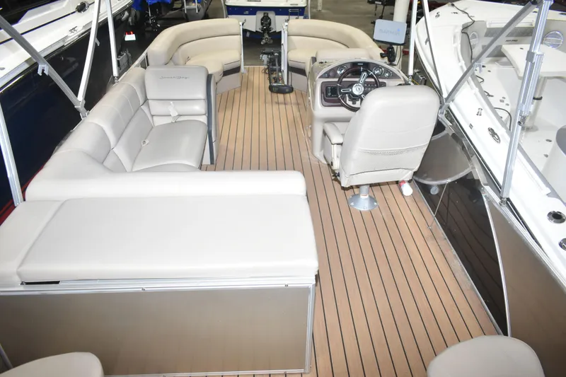 Slide: The Image of 2019 South Bay 523FCR pontoon boat interior with spacious seating and modern helm. - 13