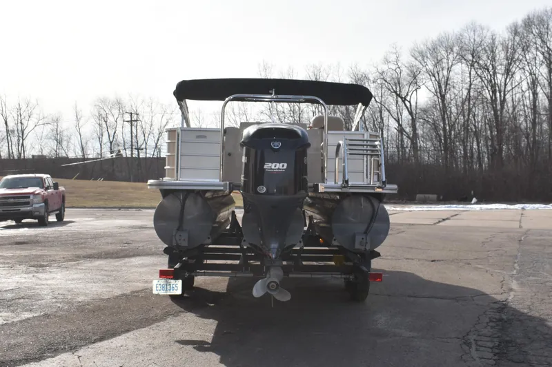 Slide: The Image of 2019 South Bay 523FCR pontoon boat with 200 HP engine on a trailer. - 5