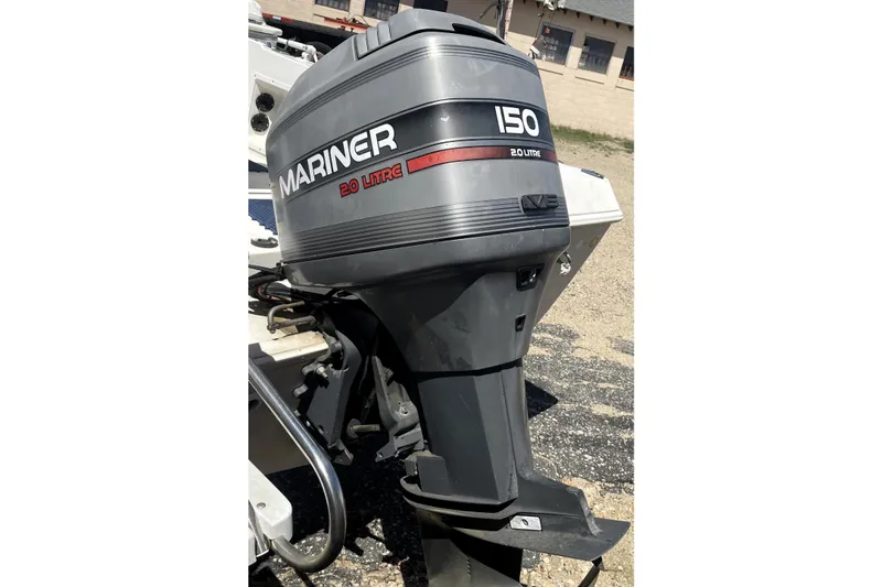 Slide: The Image of Outboard motor on a 1996 PROLINE 19 boat, Mariner 150, 2.0 Litre engine. - 6