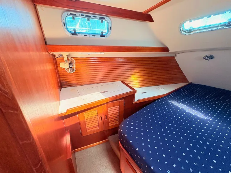 Slide: The Image of Aerial view of a 1989 Morgan 44 yacht on water. - 46