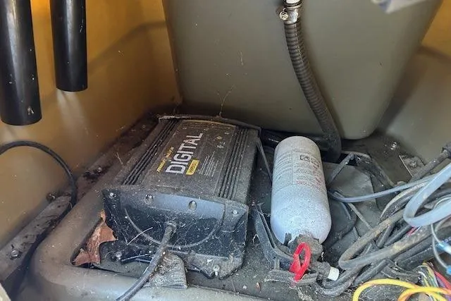 Slide: The Image of 2016 Tracker Grizzly 2072 MVX CC boat interior showing digital equipment and wiring. - 6