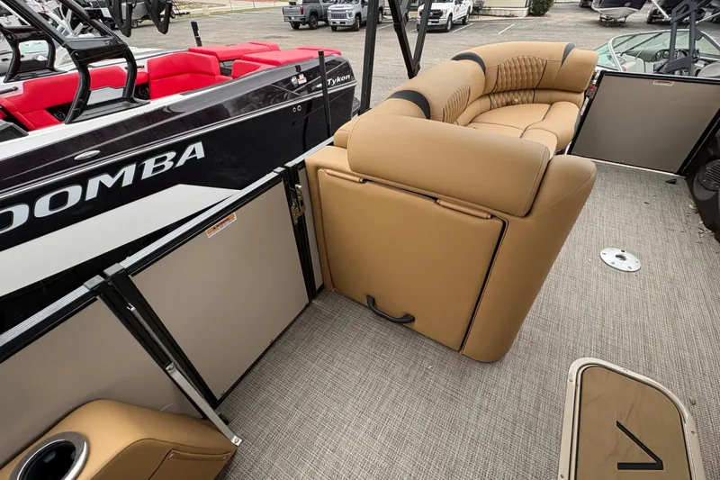 Slide: The Image of 2025 Avalon Excalibur LTD Quad Lounge interior with tan seating and modern design. - 7