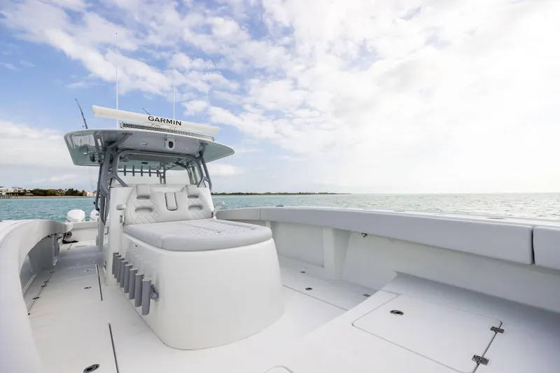 Slide: The Image of 2022 Freeman 42LR boat on calm sea under blue sky. - 12