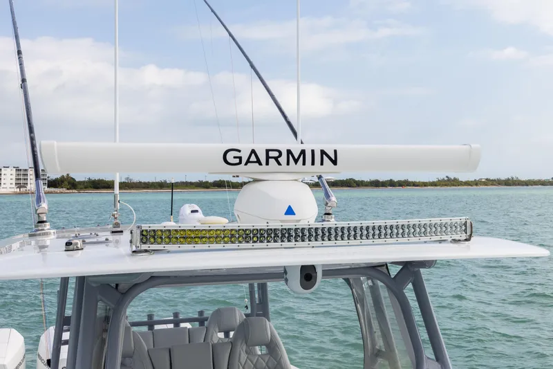 Slide: The Image of 2022 Freeman 42LR boat with Garmin radar on open water. - 14