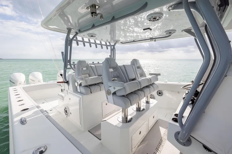 Slide: The Image of 2022 Freeman 42LR boat interior with luxury seating and ocean view. - 15