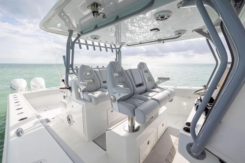 Slide: The Image of Luxurious 2022 Freeman 42LR boat interior with plush seating and ocean view. - 16
