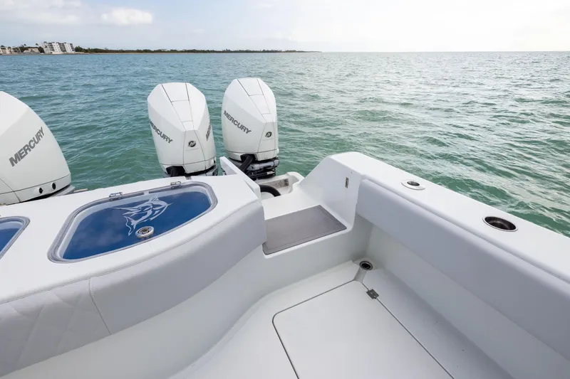 Slide: The Image of 2022 Freeman 42LR boat with Mercury engines on open water. - 32