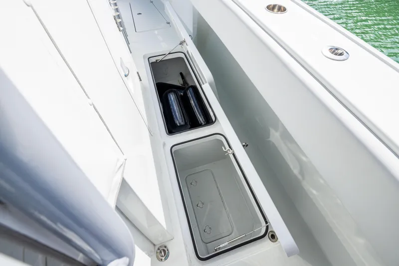 Slide: The Image of Storage compartments on a 2022 Freeman 42LR boat, featuring sleek design and functionality. - 36