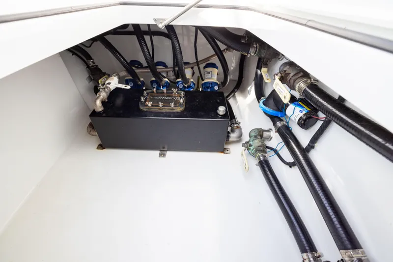Slide: The Image of Engine compartment of 2022 Freeman 42LR boat with hoses and components. - 41