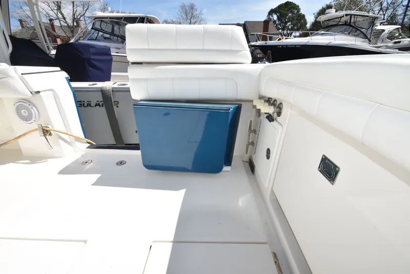 Slide: The Image of Interior of a 2018 Regulator 34SS boat with blue cooler. - 13