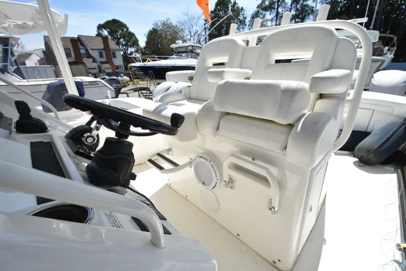 Slide: The Image of Interior view of a 2018 Regulator 34SS boat with helm station. - 20