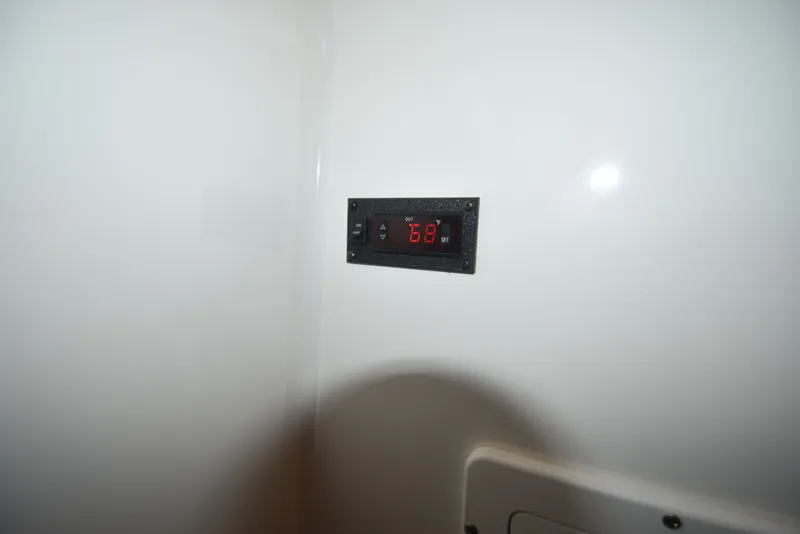 Slide: The Image of Thermostat display in Regulator 34SS boat, year 2018. - 27