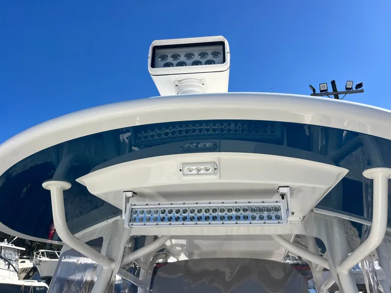 Slide: The Image of 2018 Regulator 34SS with LED lights under blue sky. - 3