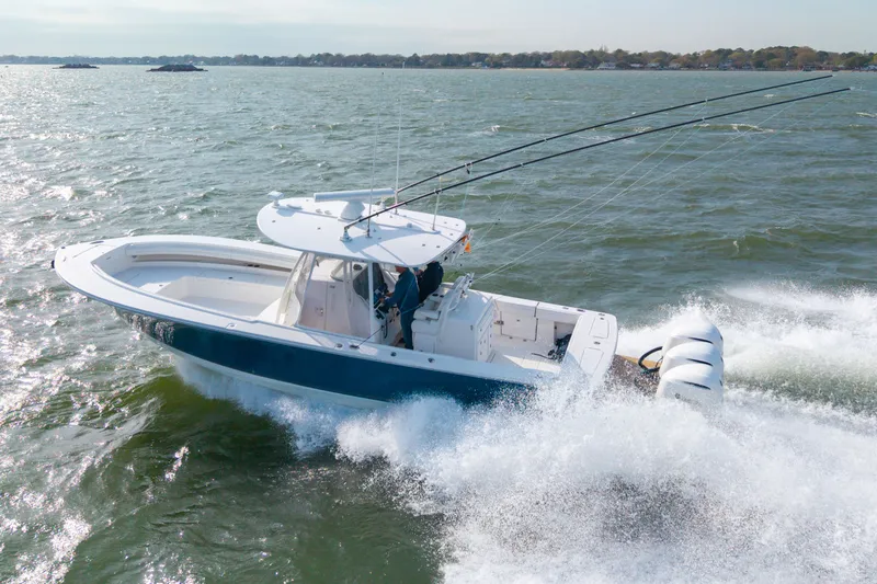 Slide: The Image of 2018 Regulator 34SS boat navigating choppy waters. - 7