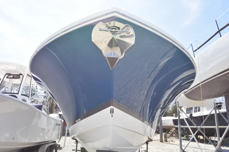 Slide: The Image of Front view of a 2018 Regulator 34SS boat in dry dock. - 8