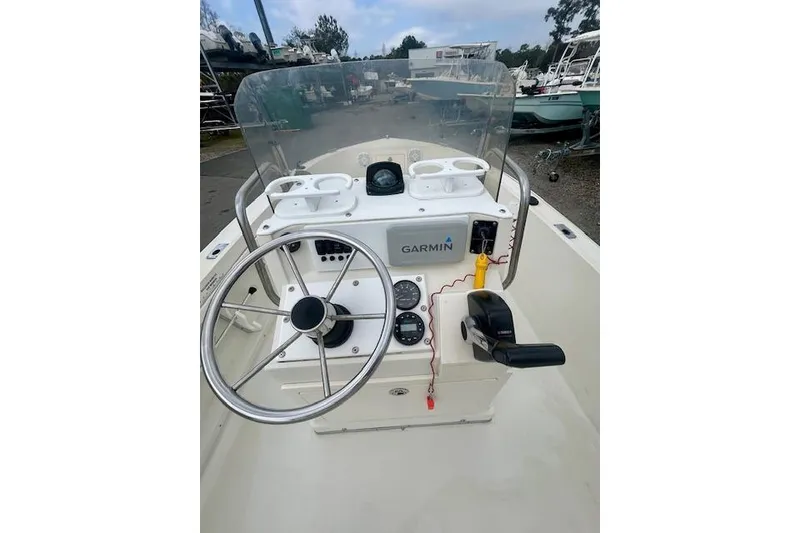 Slide: The Image of 1984 Hydra-Sports 1800 CC boat console with Garmin navigation system and steering wheel. - 9
