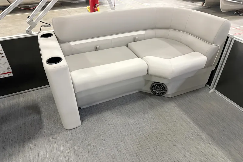Slide: The Image of Luxurious seating on 2026 Godfrey EX 2286 SBX pontoon boat with integrated cup holders. - 5