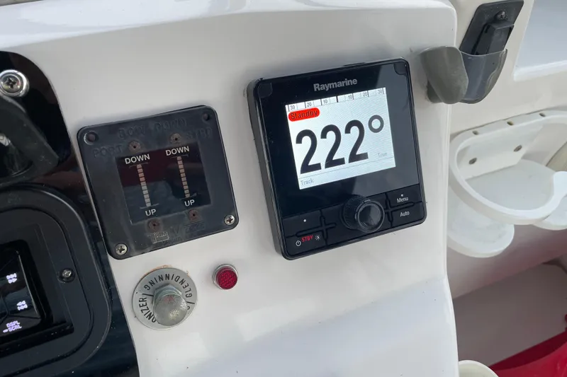 Slide: The Image of Control panel of 2003 Mainship 430 Trawler with Raymarine display showing 222 degrees. - 50