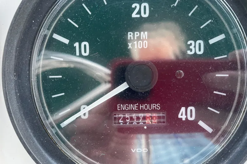 Slide: The Image of Close-up of Mainship 430 Trawler 2003 tachometer showing engine hours. - 51