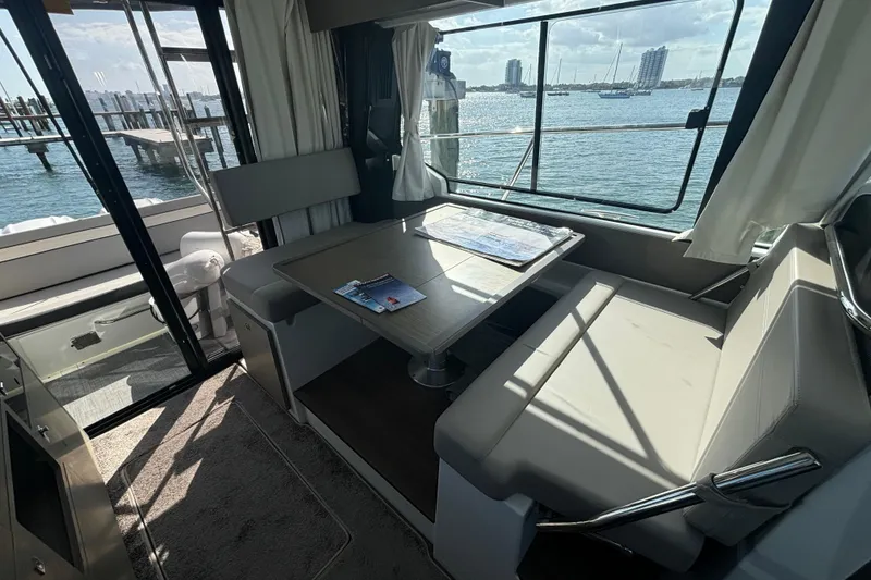 Slide: The Image of Interior of 2024 Jeanneau NC Weekender 1095 Fly with waterfront view. - 11