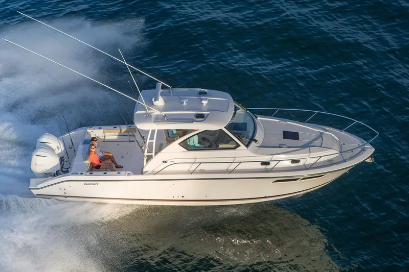 The Image of Manufacturer Provided Image: 2016 Pursuit OS 355 Offshore boat cruising on open water. - 0