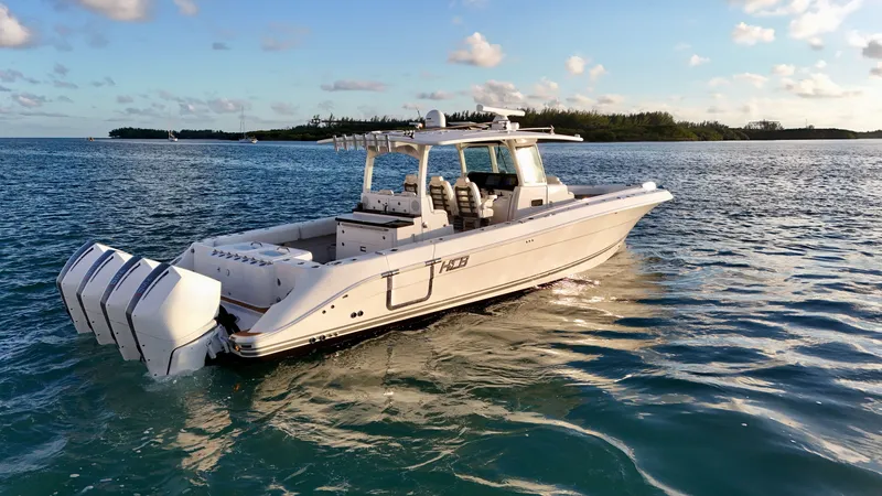 Slide: The Image of Luxurious 2021 HCB Lujo boat on calm waters. - 10