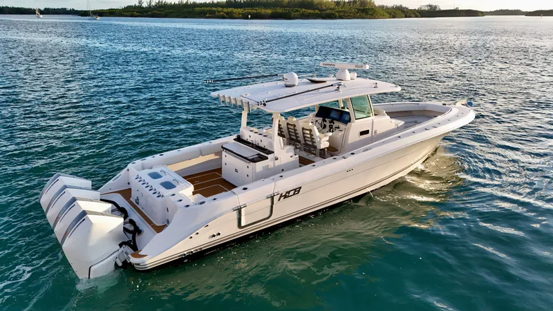 Slide: The Image of HCB Lujo 2021 motorboat on calm waters. - 11