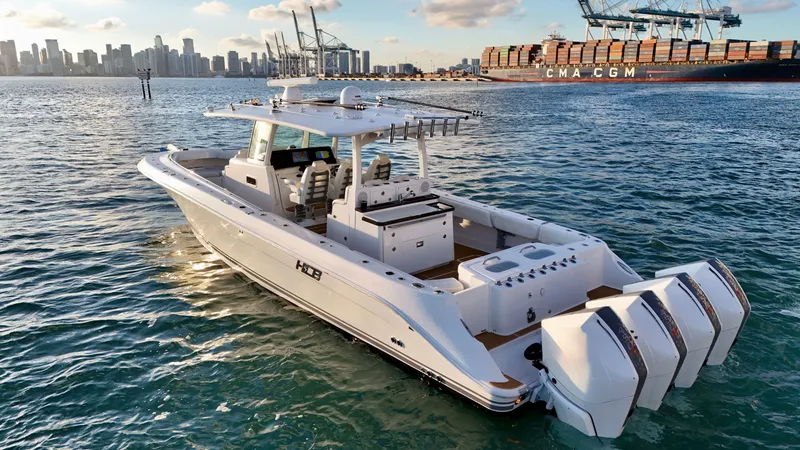 Slide: The Image of Luxurious 2021 HCB Lujo boat on water with city skyline background. - 14