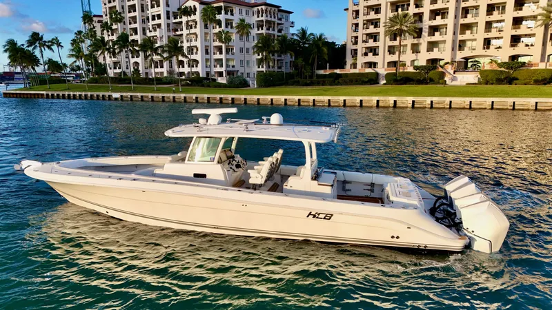 Slide: The Image of Luxury HCB Lujo 2021 yacht near modern buildings. - 8