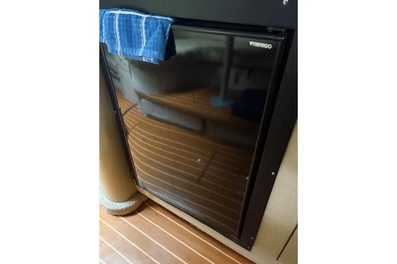 Slide: The Image of Vitrifrigo refrigerator in 1998 Sea Ray Sundancer 330 yacht interior. - 13