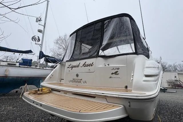 Slide: The Image of 1998 Sea Ray Sundancer 330 boat docked, named "Liquid Asset," in Urbanna, VA. - 2
