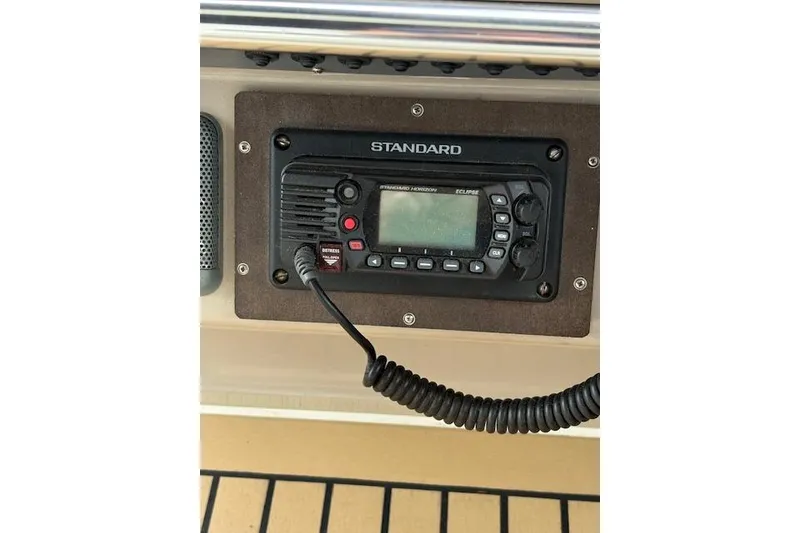 Slide: The Image of Marine radio on 1998 Sea Ray Sundancer 330 boat dashboard. - 21